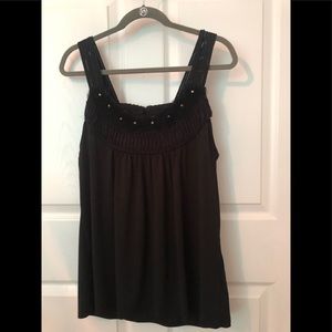 Strappy tank with floral like embellishments